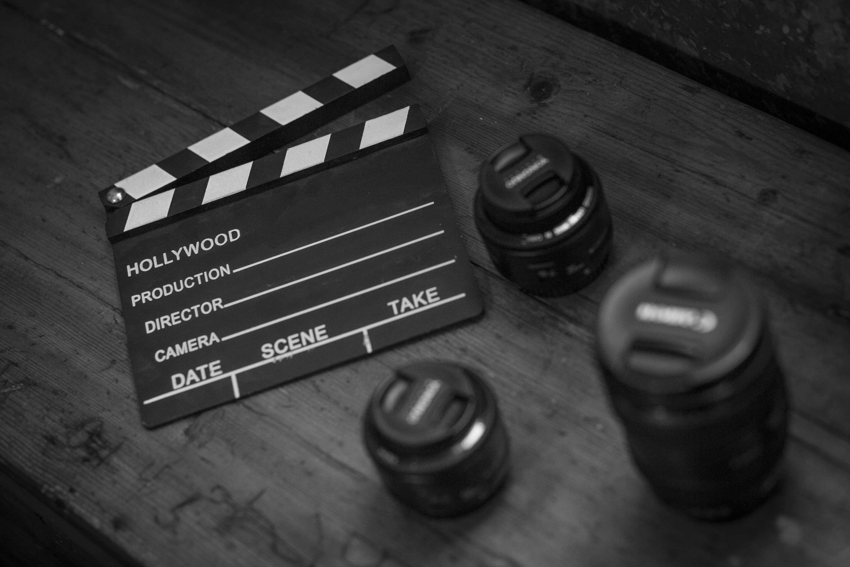 Clap de cinéma avec des objectifs d'appareil photo